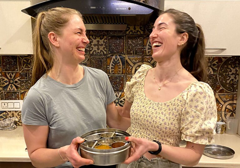 Guest having fun cooking indian food