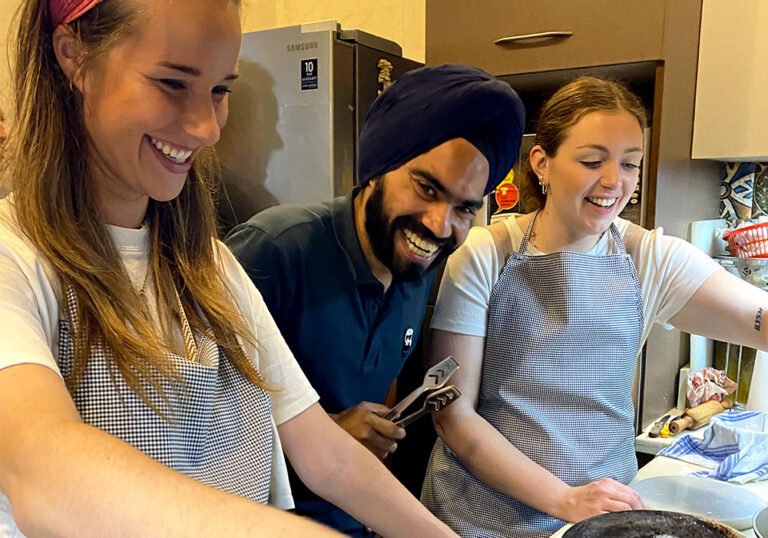 happy guest while cooking indian food