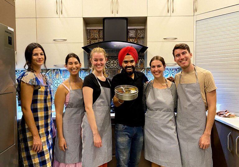 Jd with happy guest on art of indian cooking class