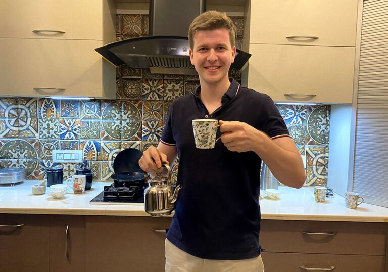Guest drinking chai Guest drinking chai