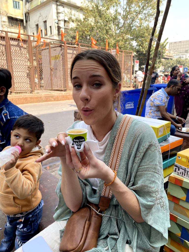 Beautiful tourist on a guided tour in india scaled