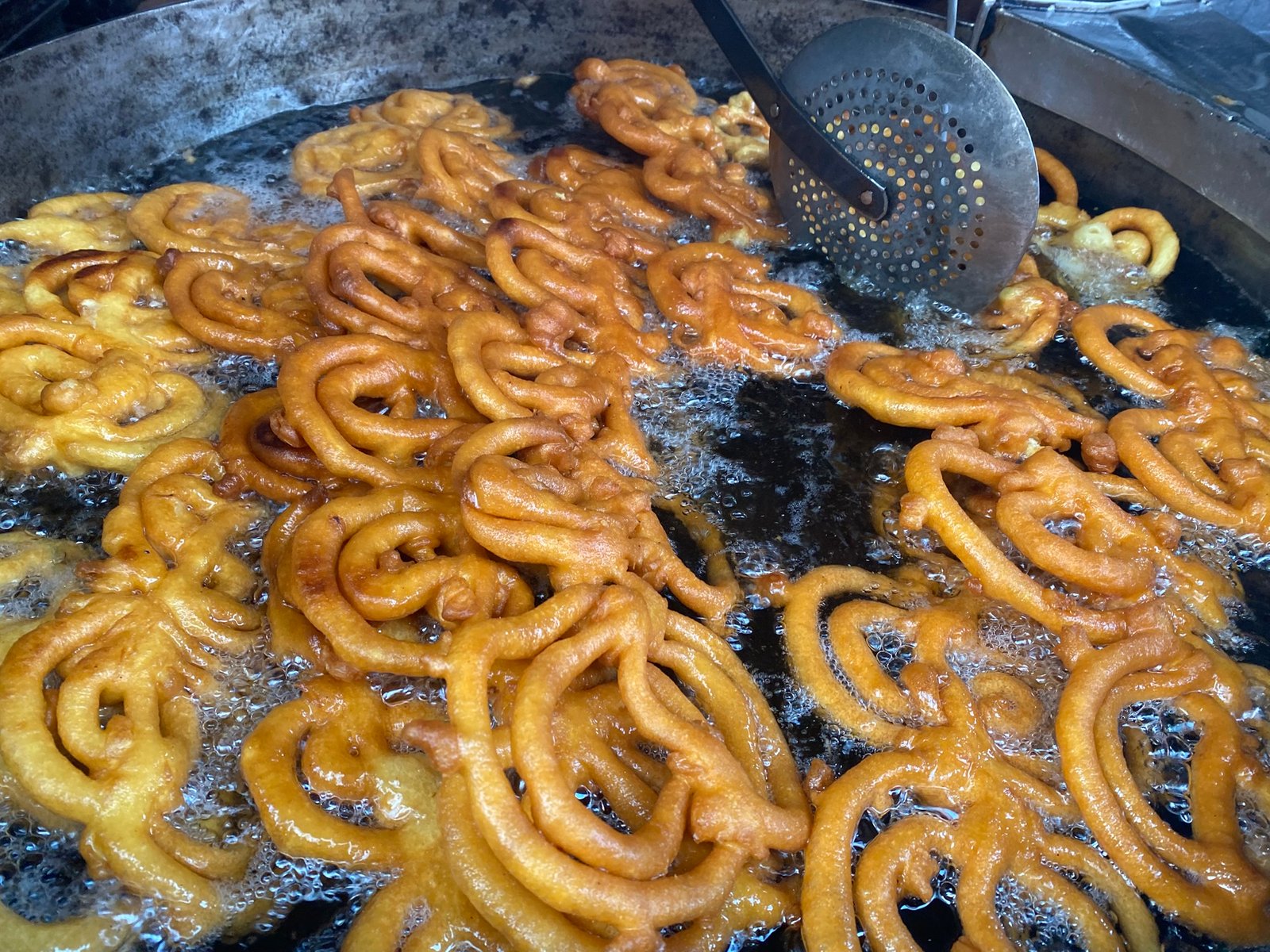 Fresh jalebi at a legendary Old Delhi sweet shop, a staple on the Explore Real India food tour