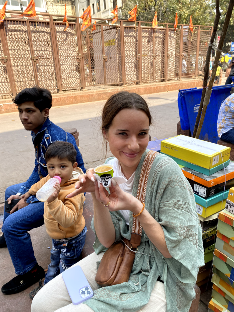 Solo Girl Sipping Safe Street Chai scaled