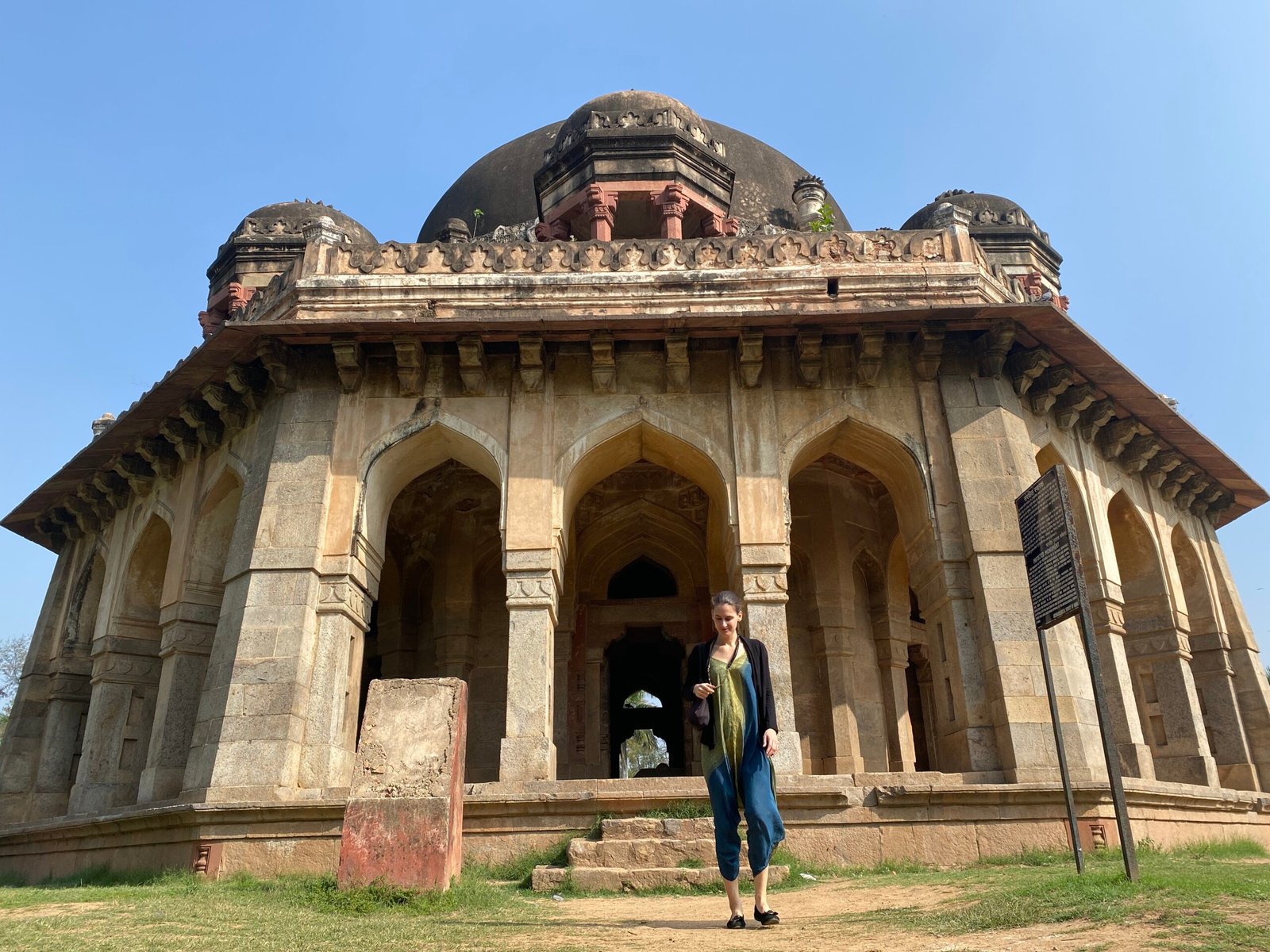 Solo female traveler exploring Lodhi Gardens in Delhi