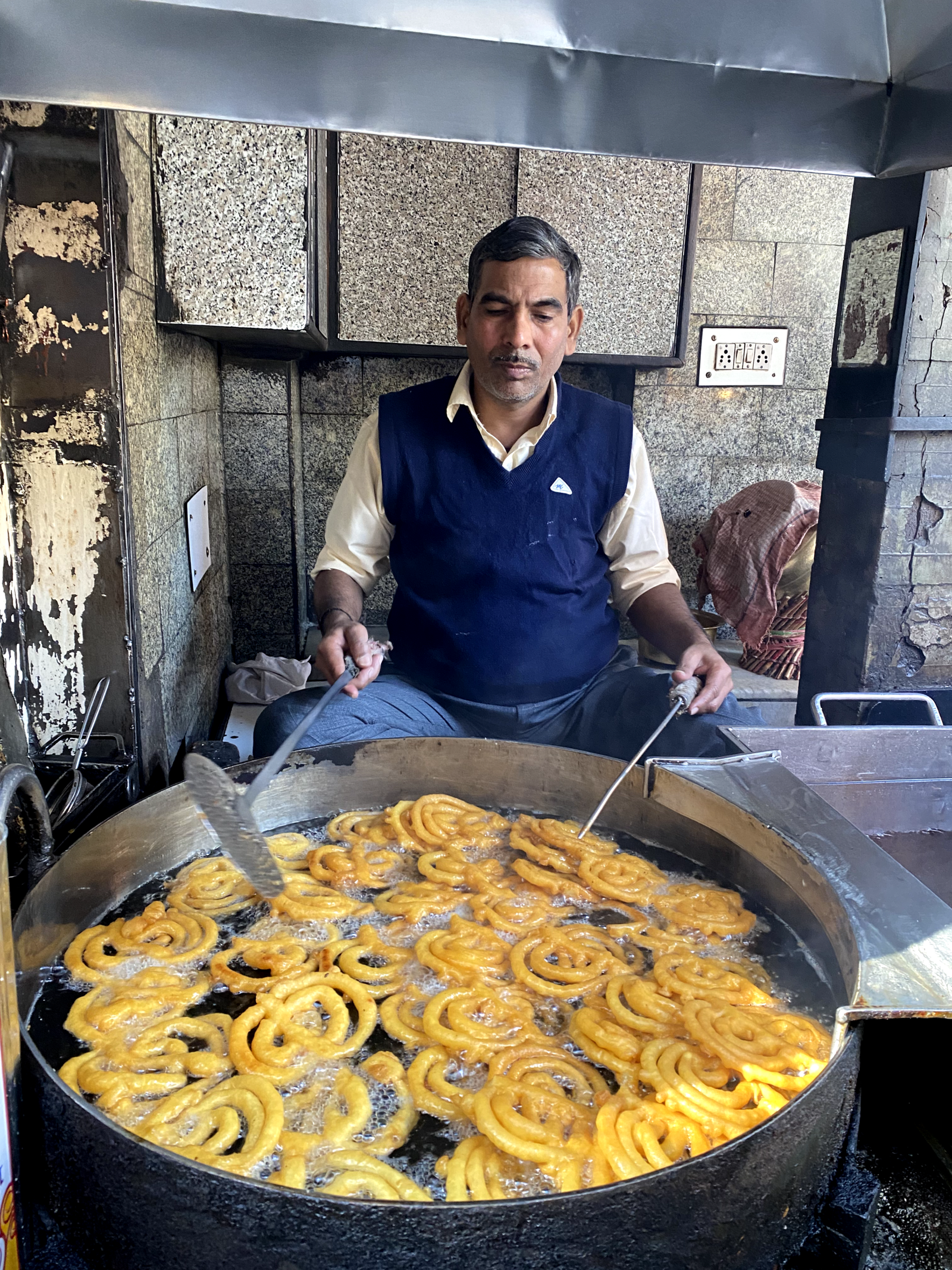 Clean street food vendor in Old Delhi on a guided food tour for international travelers