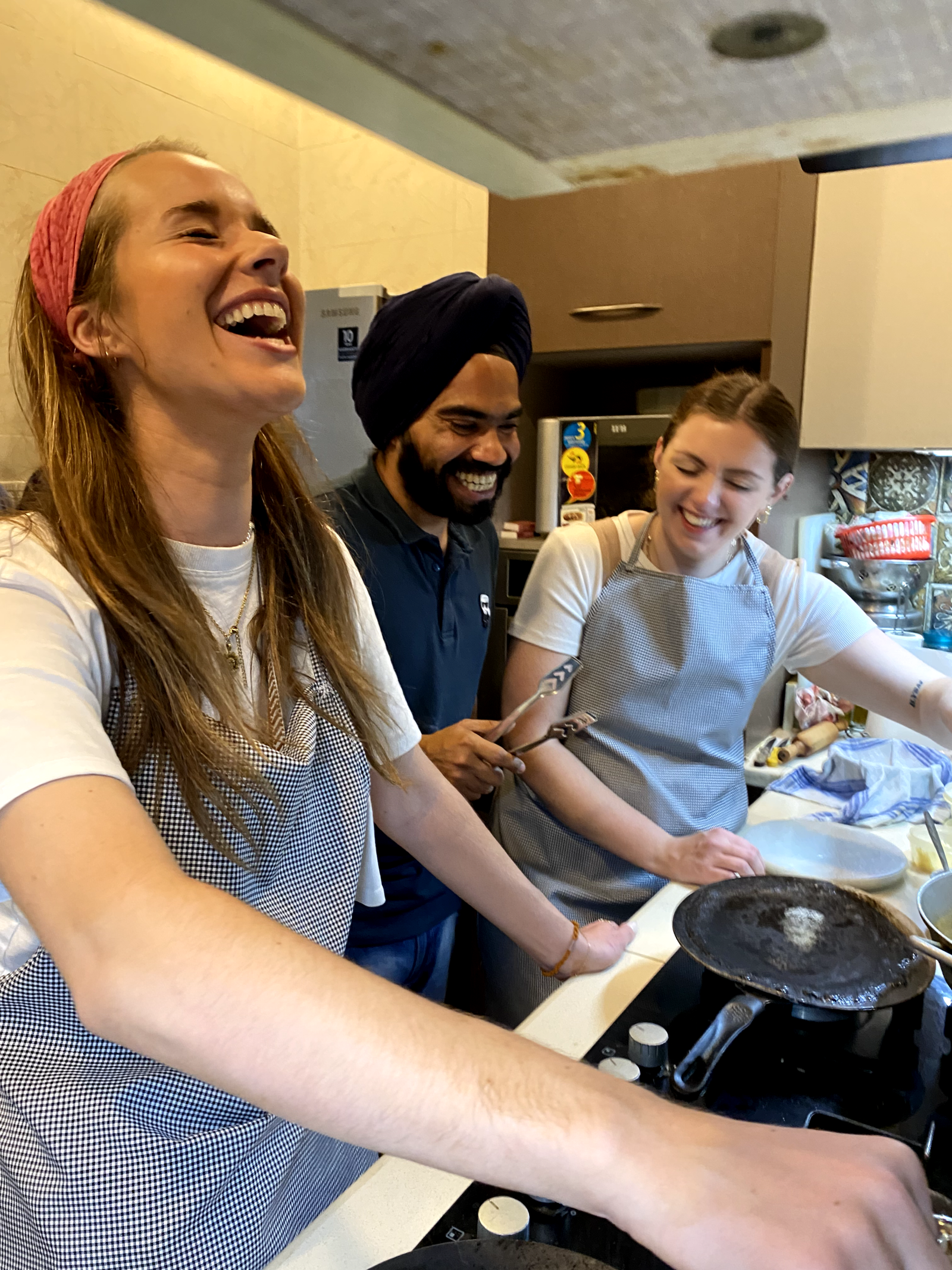 Hands-on Indian food making class inside a local Delhi home