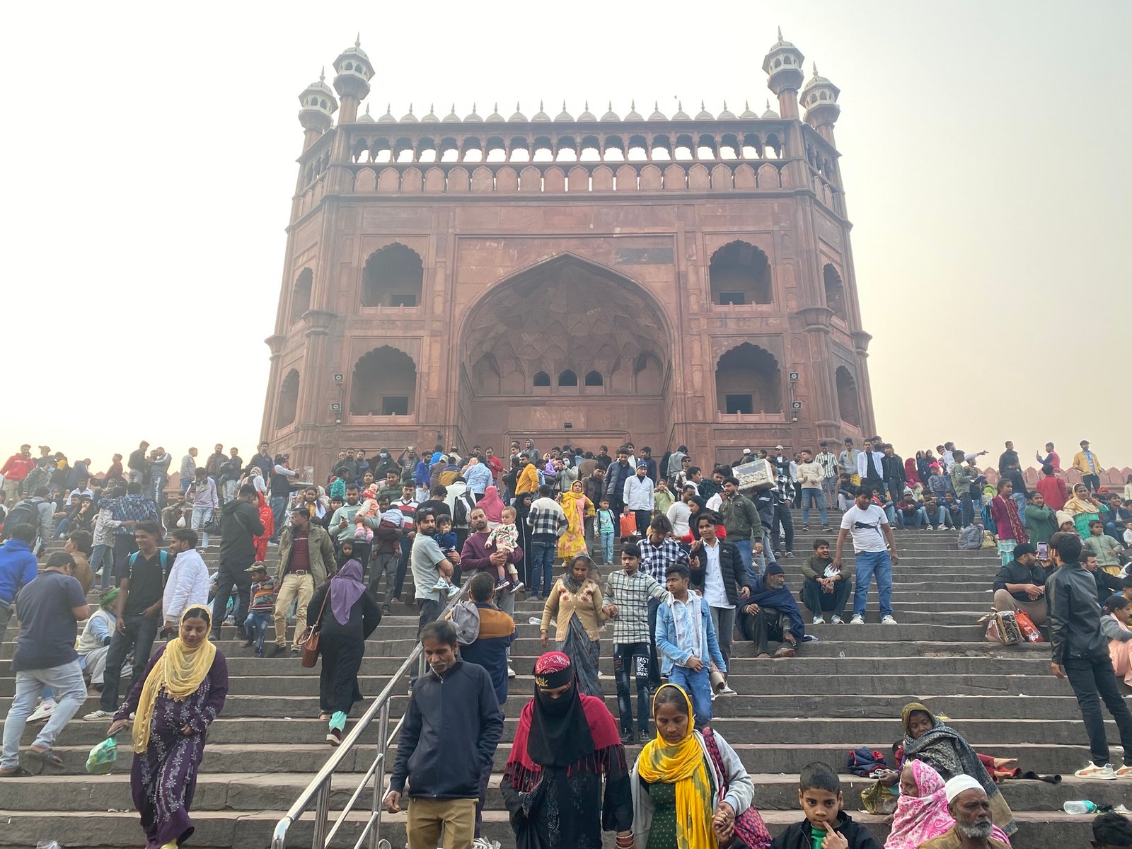 Aerial style view of Jama Masjid domes overlooking Old Delhi rooftops