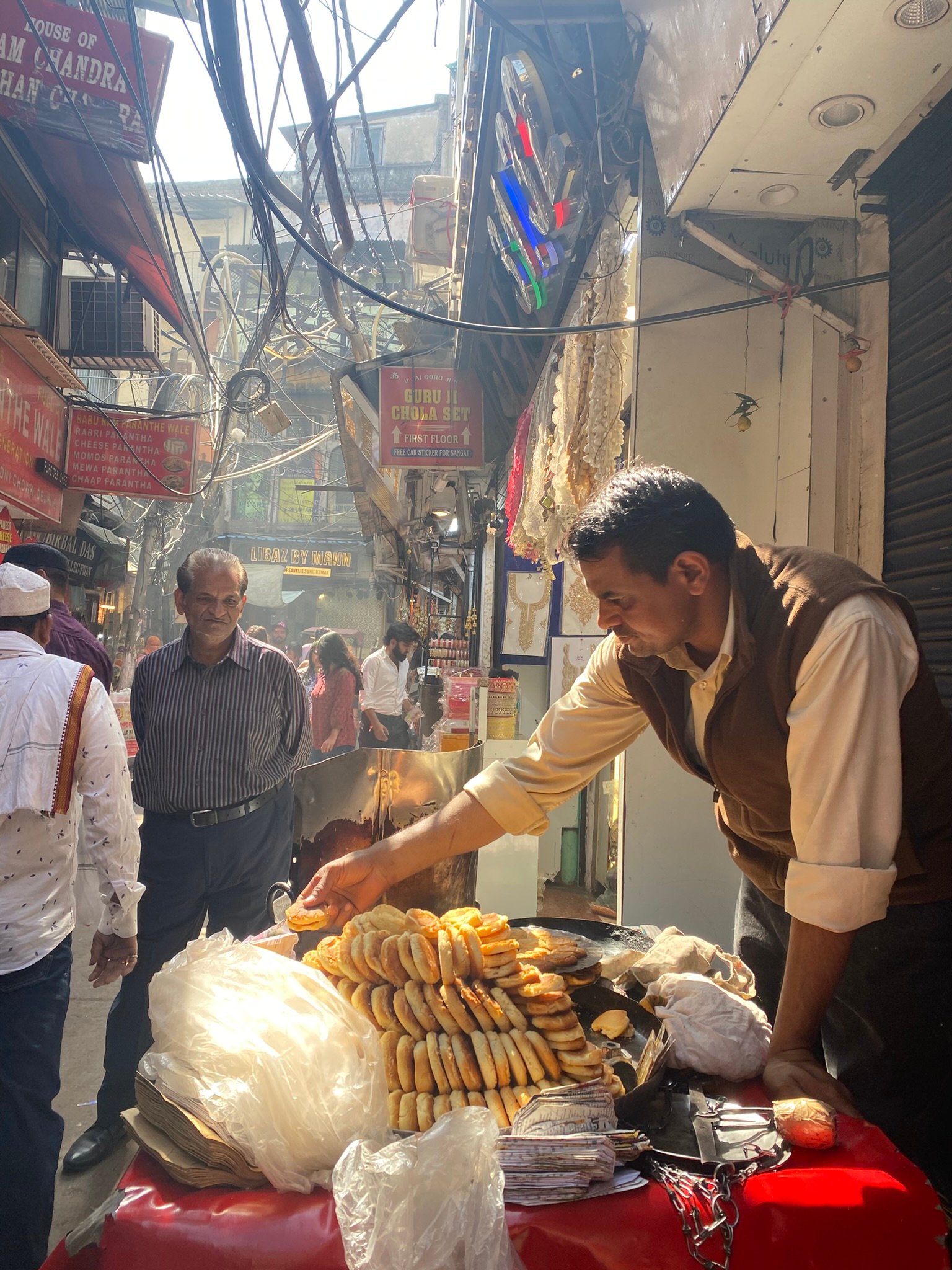 Street portraits and local life captured during an Old Delhi food and culture walking tour