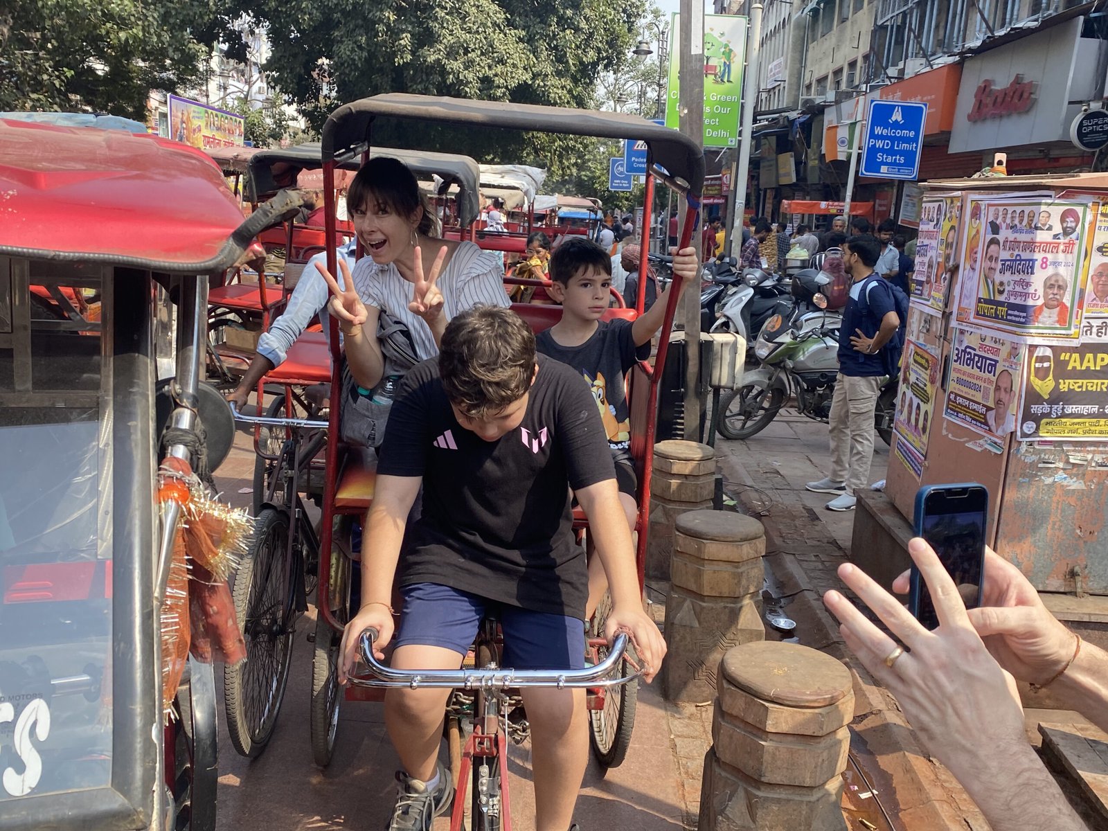Guests enjoying a cycle rickshaw ride through Old Delhi on a food tour