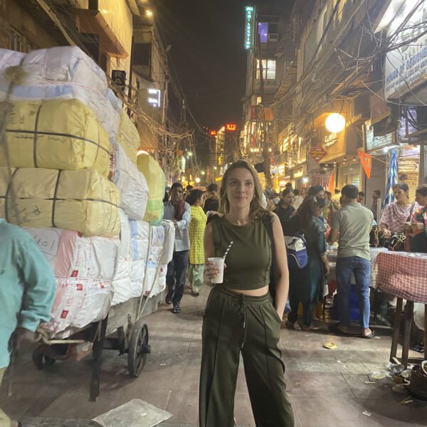guest posing in old delhi on evening food tour