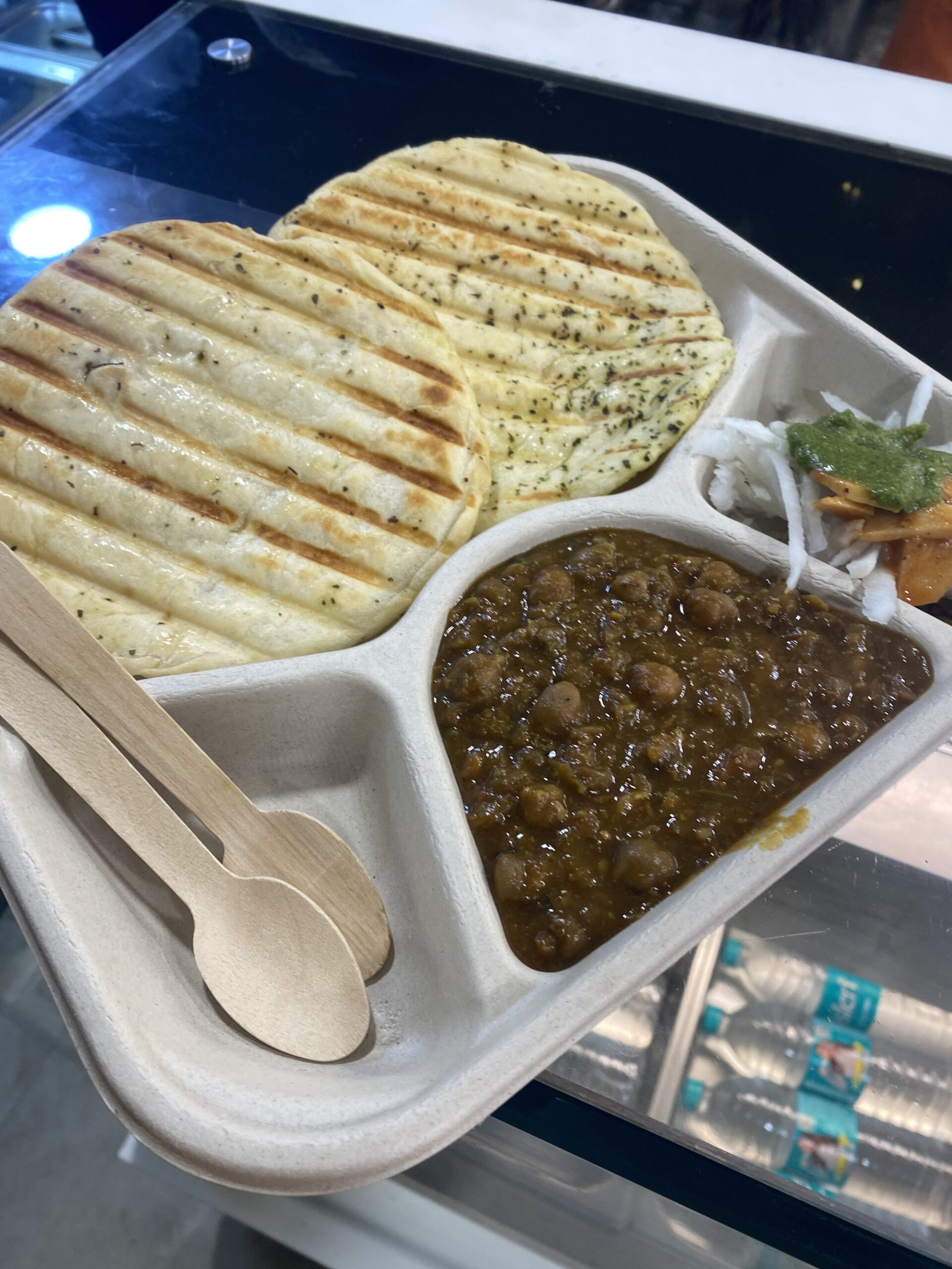 Kulcha chole being served at a street stall in Old Delhi