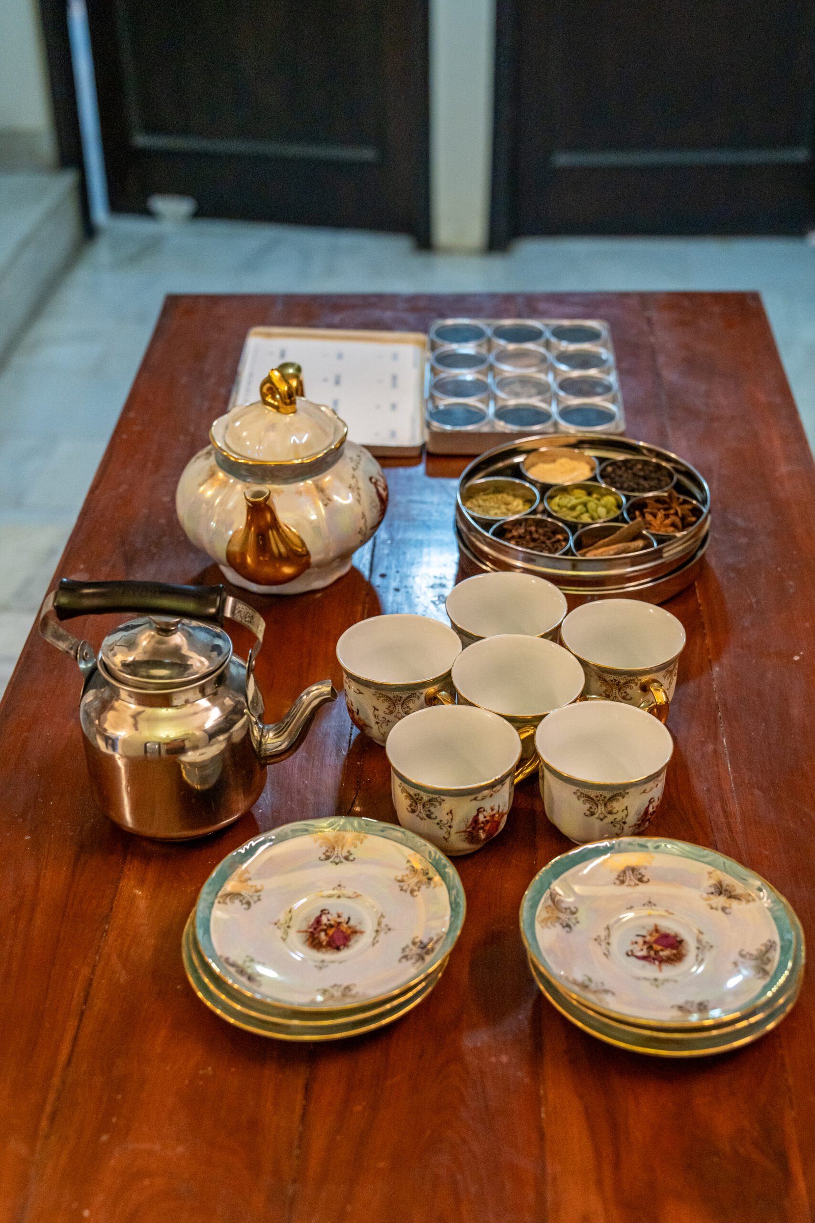 Homemade masala chai being prepared in a traditional Indian home