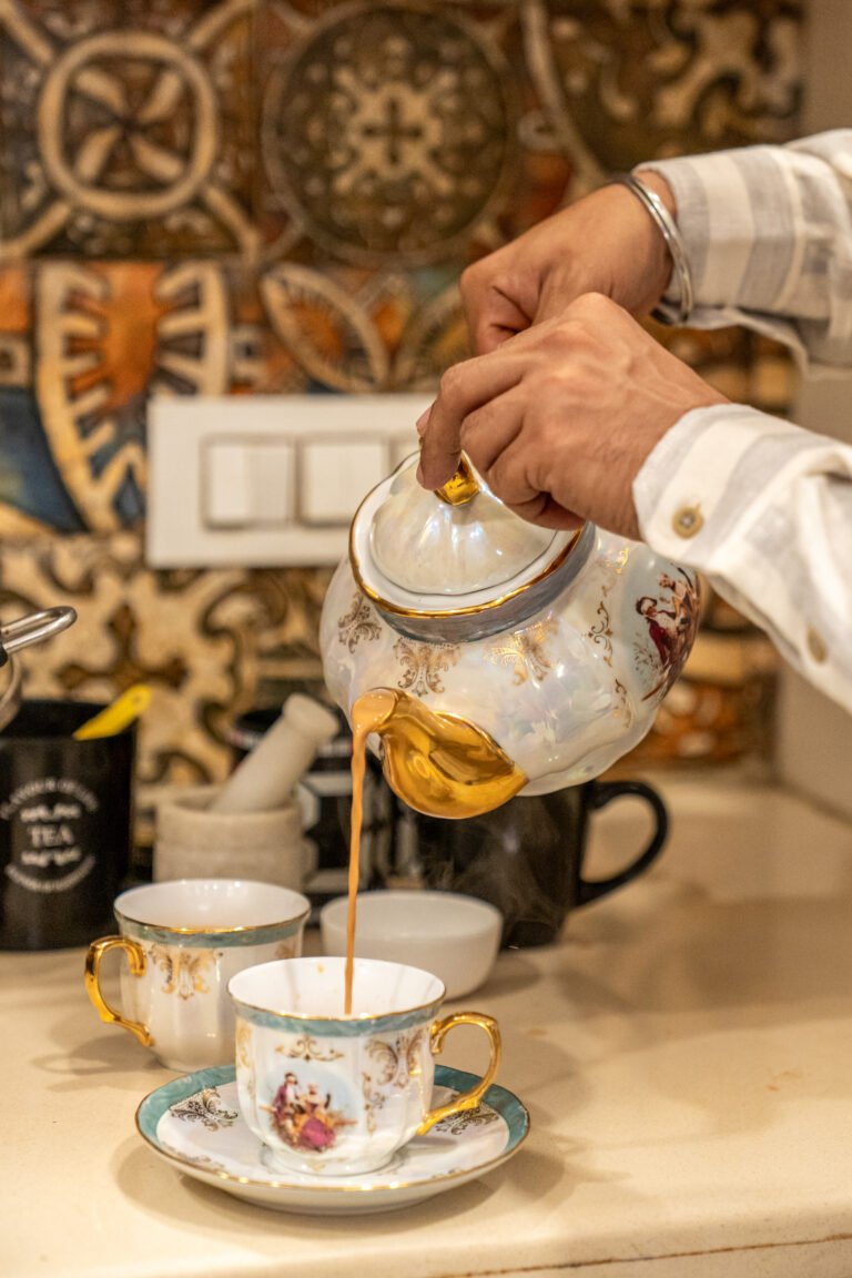 pouring authentic masala chai
