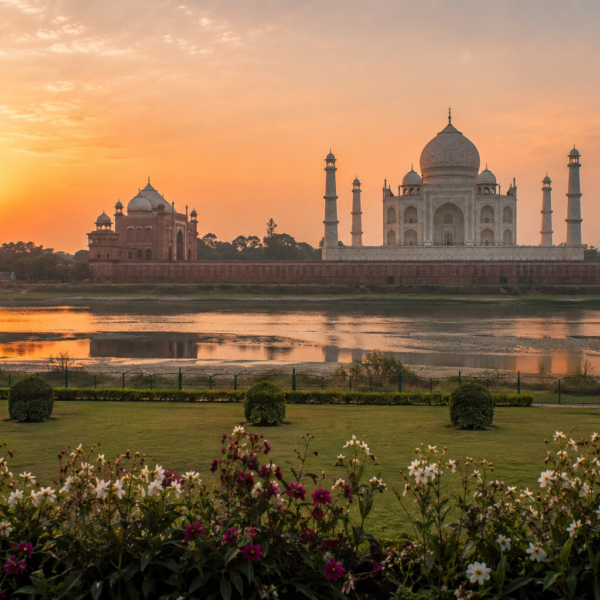 sunset view of the Taj Mahal as seen from Mehtab Bagh across the Yamuna River
