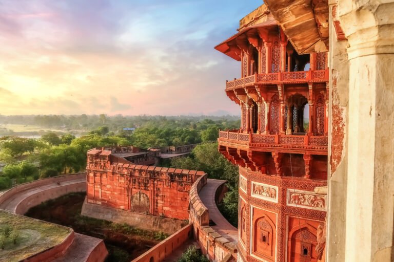 agra-fort-famous-medieval-historic-fort-exterior-structure-with-view-of-agra-city-landscape-at-sunrise Agra Fort Famous medieval historic fort exterior structure with view of Agra city landscape at sunrise
