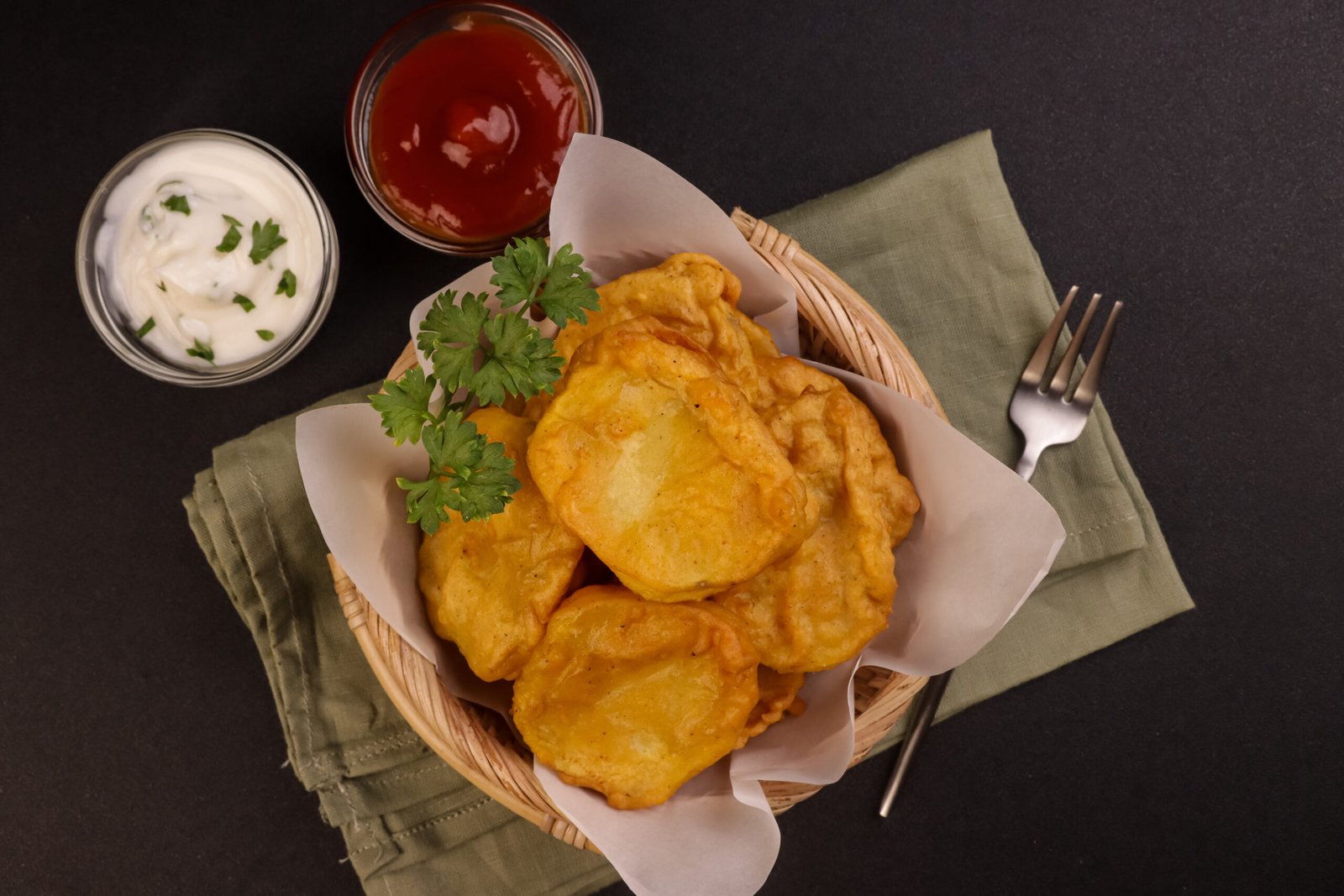 Aloo pakora Indian potato fritters served hot with chutney