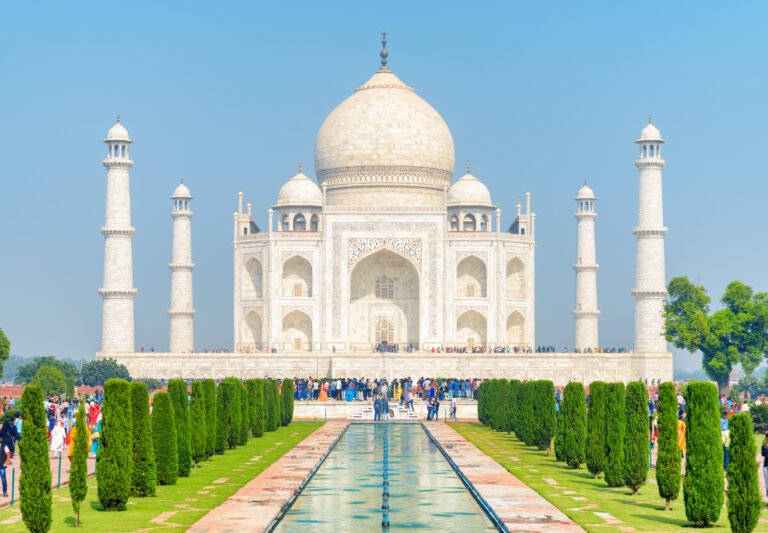 colorful-crowds-of-tourists-walking-along-the-taj-mahal-complex Colorful crowds of tourists walking along the Taj Mahal complex
