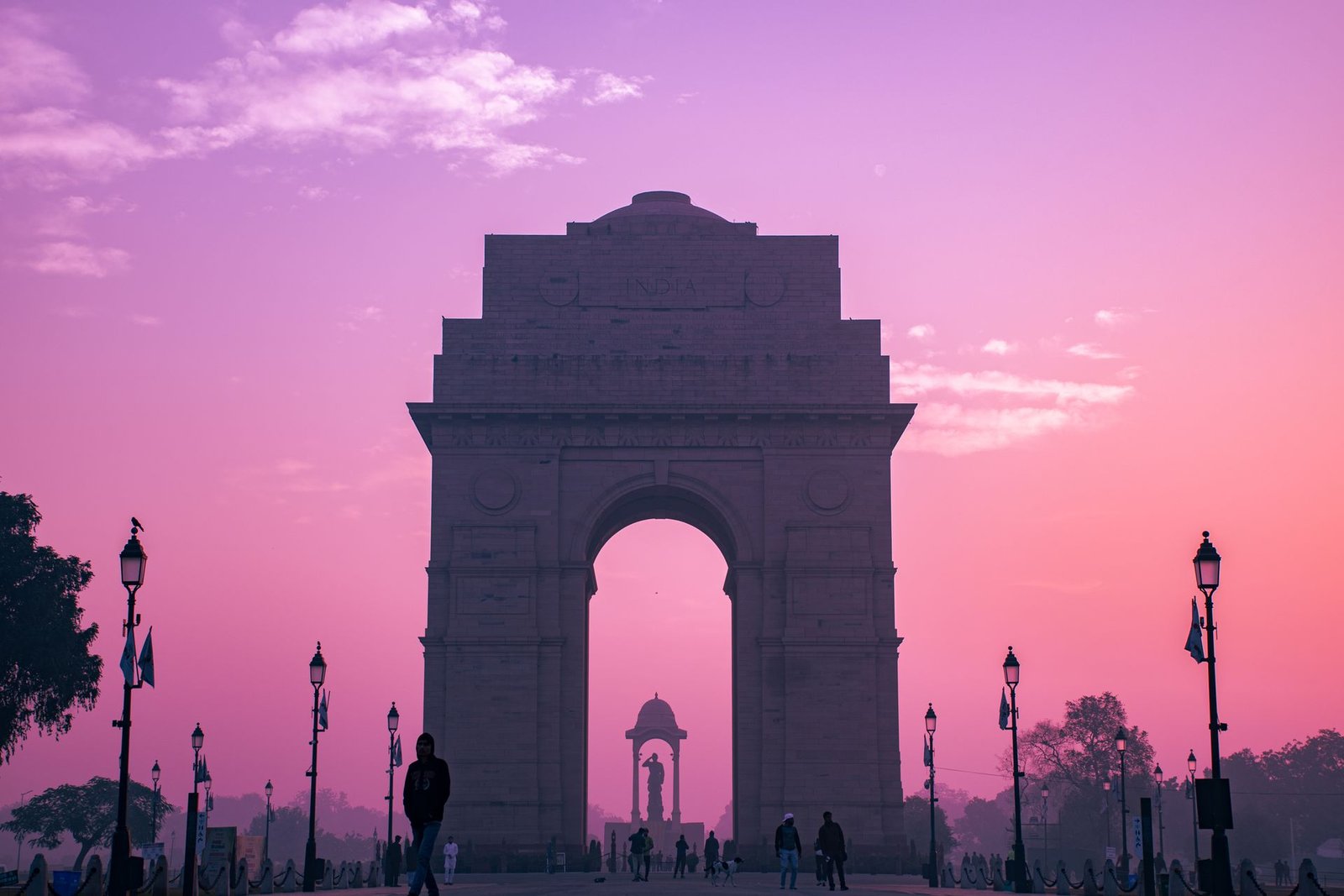 India Gate at sunrise with pink sky in New Delhi