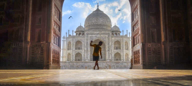 a-boy-standing-near-taj-mahal-standing-near-river-yamuna-taj-mahal-is-famous-for-own-beauty-and-one-of-the-wonders-of-the-world a boy standing near taj mahal, Standing near River Yamuna. Taj Mahal is famous for Own beauty and one of the wonders of the world.
