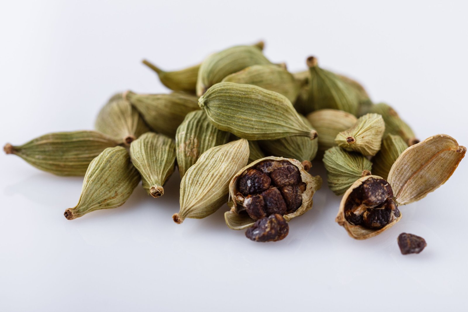 Fresh green cardamom pods used in masala chai spice blend